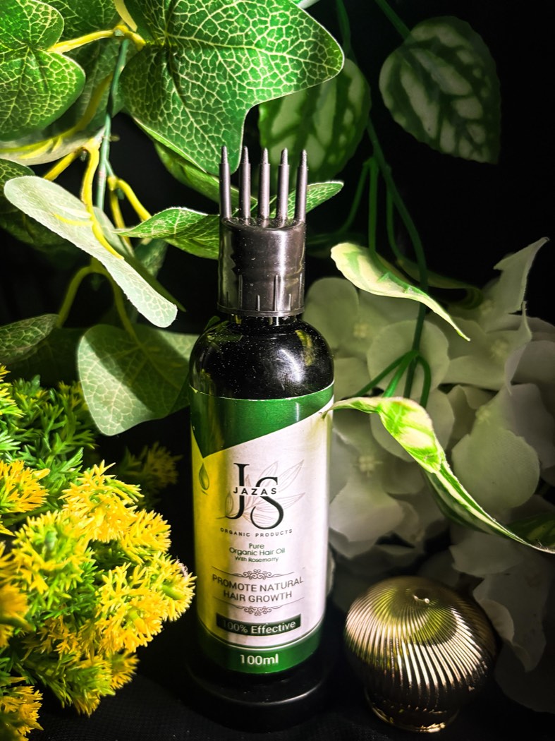 Jaza's hair oil styled with fresh botanicals